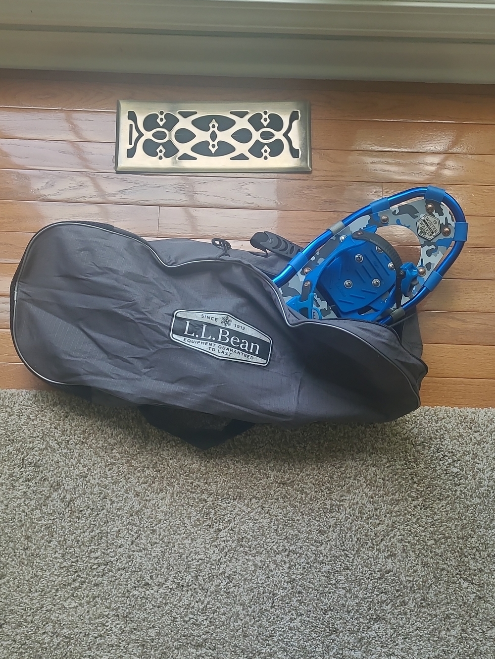 L.L. Bean Black Duffel-Style Snowshoe Carry Bag with Blue Snowshoes